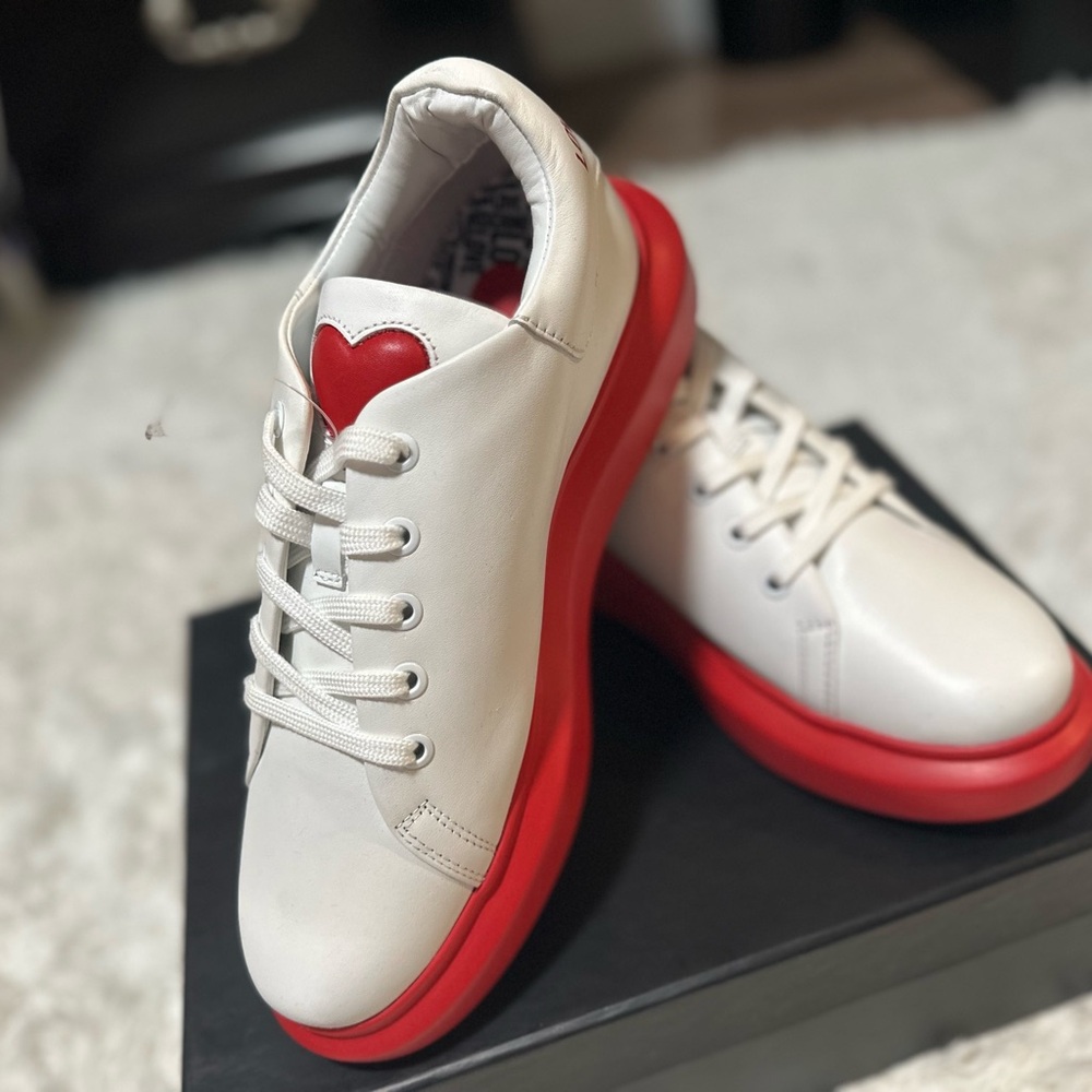 White Sneakers with Red Heart Accent